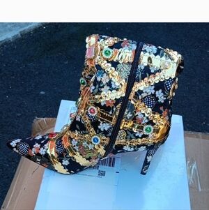 Chic Black and Gold Patterned Heeled Boots